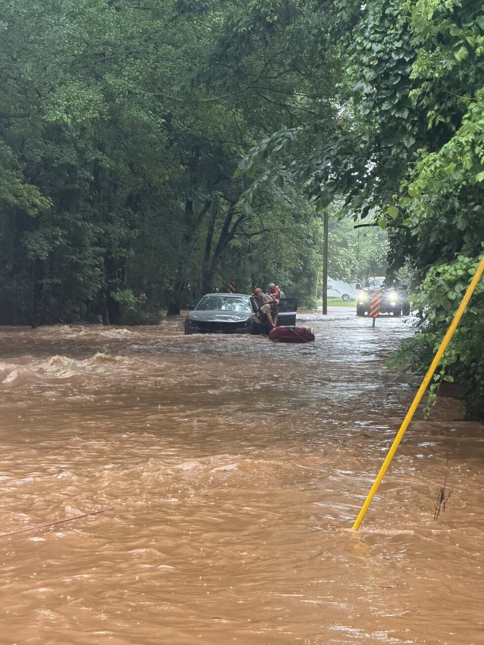 One of several incidents involving vehicles trapped in floodwaters in the Moores Mill area on...
